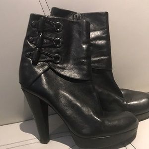 pretty black boots at ankle height.